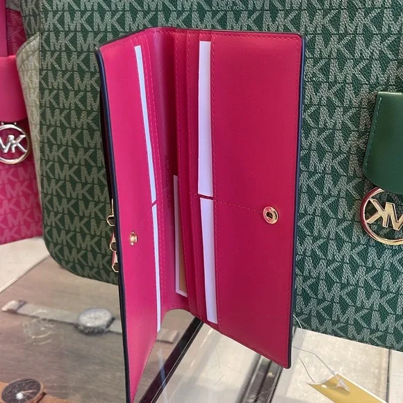 MICHAEL KORS
Reed Large Snap Signature Wallet
Electric Pink NWT - Picture 14 of 16